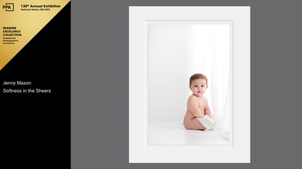 baby in white window playing with curtain award winning photo award winning diamond photographer